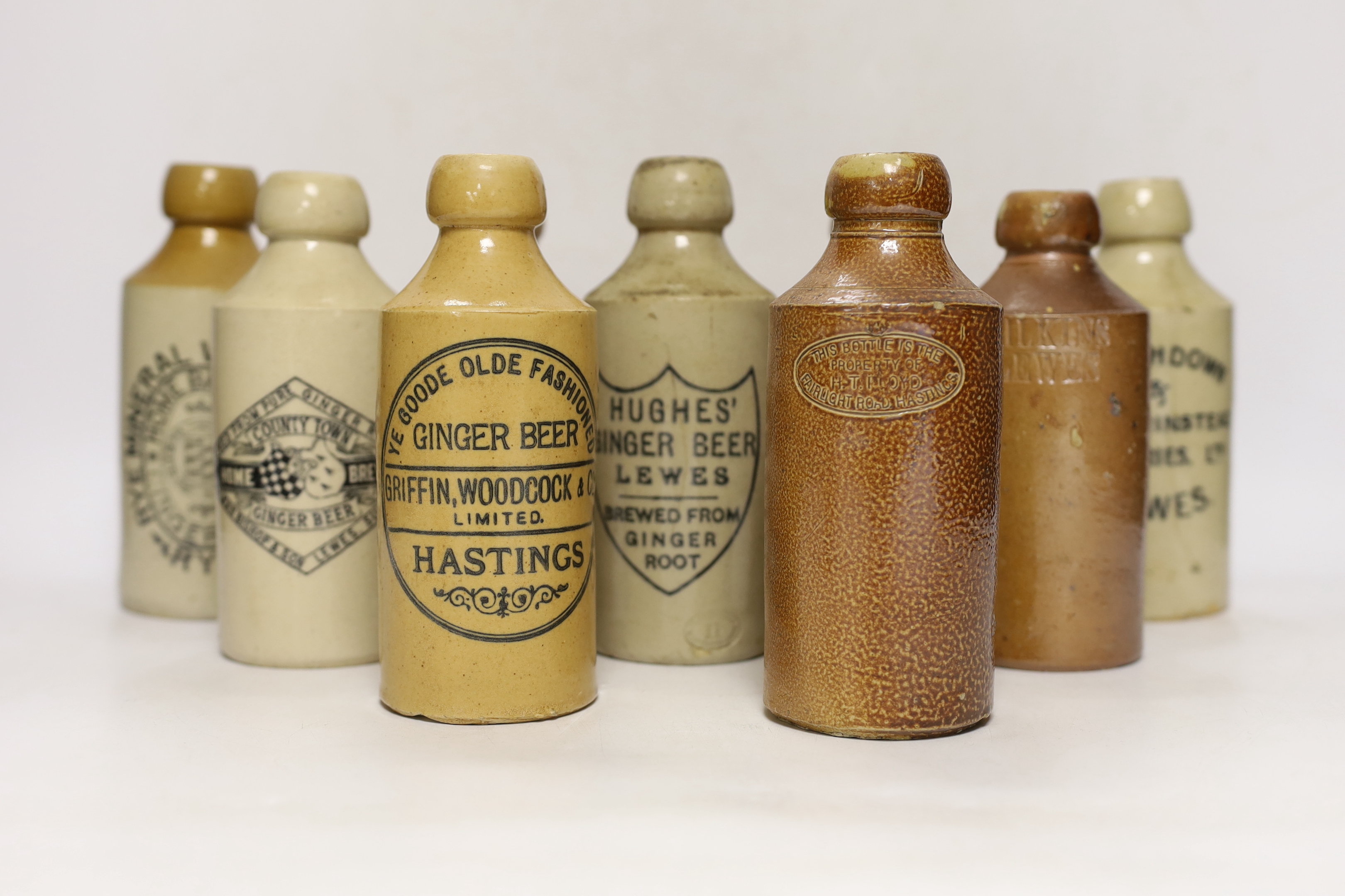Early 20th century stoneware ginger beer bottles, four from Lewes, three from Hastings, two from Rye and one from St Leonards (10)